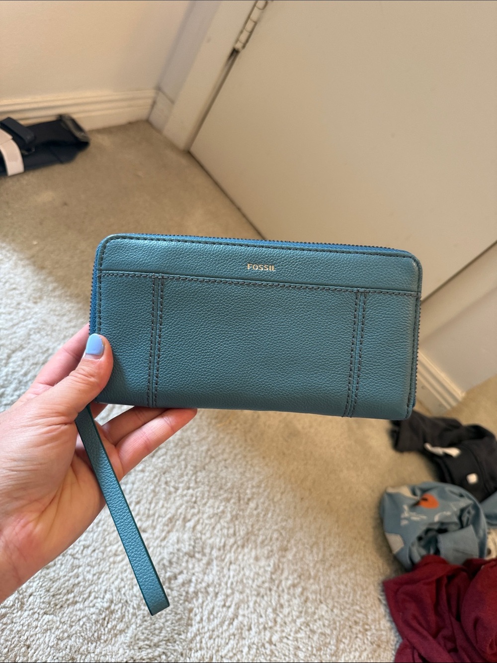 Fossil wallet with wrist strap
